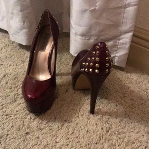 Steve Madden spiked maroon platform 5” heels.